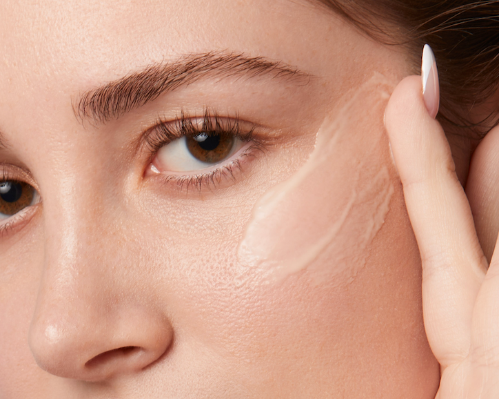 Close-up of healthy, natural-looking skin using Six Gldn Essential Moisturizer