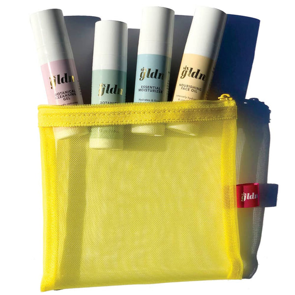 15 ml Six Gldn Glow bag with light pink Botanical Cleansing Gel, mint green Botanical Toner, light blue Essential Moisuturizer and light yellow Nourishing Face Oil